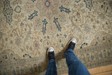 Even wear and low pile on a vintage Kayseri rug with scrolling floral vines.