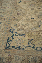 Close-up on the even wear and visible knot heads of a distressed vintage Kayseri carpet.