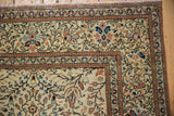 Vintage Turkish Sparta carpet corner, detailed with delicate vines, blossoms, and tendril border.