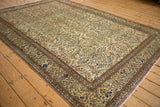 Vintage Turkish Sparta rug corner: delicate vines, blossoms, botehs, and terracotta scrolled border.