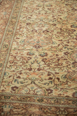 Vintage hand-knotted Kayseri carpet with floral patterns in cream, sandalwood, and mauve.