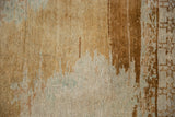 Abrashed ground of a distressed Kars rug showing wear to knot heads and hints of seafoam green.