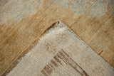 Hand-knotted foundation and secured side cord of a vintage distressed Kars carpet.