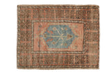 Vintage distressed Oushak rug with dusty rose, denim blue stepped medallion and border.