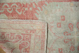 Hand-knotted foundation and restored side cord detail on a vintage Oushak runner.
