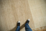 Textural short pile and heavy color abrash on a geometric vintage distressed Kars rug.