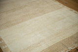 Dynamic abrash and dye lot variations visible on the short pile of a vintage distressed Kars carpet.