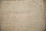 Hand-knotted weave and foundation on the reverse of a vintage Oushak rug.