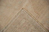 Corner view of the hand-knotted foundation and low pile of the vintage Turkish rug.
