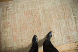 Top-down view showing the scale and distressed texture of a vintage Anatolian rug.