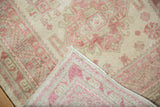 Corner view showing the low pile and the hand-knotted weave on the back of a Turkish rug.