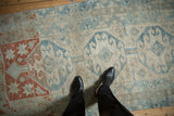 Evenly worn hand-knotted pile of a vintage distressed Anatolian rug shown underfoot.