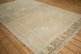 Soft, blanket-like texture and heavy color abrashes on a vintage distressed Oushak carpet.