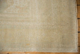 Soft, blanket-like texture showing the even wear and low pile of a distressed Oushak.