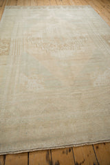 Soft blanket-like texture and heavy abrashes on a distressed vintage Oushak carpet.
