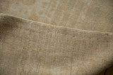 Hand-knotted foundation and secure side cord selvage of a vintage Turkish Oushak carpet.