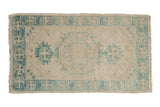 Distressed Turkish Oushak runner with faded sky blue hexagonal medallion on antique ivory, 2'3