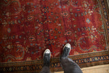A personal view of the time-softened colors and sprawling vines on a vintage Sarouk rug.