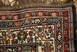 Corner detail of a collector Afshar rug showing coarse wool weave and stylized floral borders.