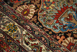 Hand-knotted artistry showing stylized floral medallions on a unique antique Afshar rug.