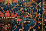Detail showing a small hole and knot heads on an early 20th-century Afshar rug.