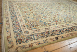 Floating main border with Rococo stylized vines on a vintage Persian Kashan carpet corner.
