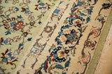 Unusual floating main border with Rococo vines over ivory and pistachio green fields.
