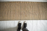 Finely rendered stripes with delicate floral motifs on an antique silk brocade sash.