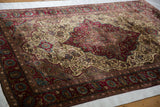 The master weaver's art is shown in the lustrous silk pile of an antique Persian Kashan.
