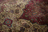Fine weave and master-level detail of botehs and vines on an antique Mohtashem Kashan rug.