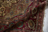 The supple, blanket-like quality of an antique silk Mohtashem rug with a velvety, low pile.