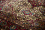 Articulated pile showing master-level botehs and vines on an antique silk Mohtashem Kashan.