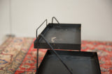 Detail of age-related wear on the top tray of the Philco display stand.