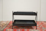 The A-frame structure and dual trays of the vintage metal Philco stand.