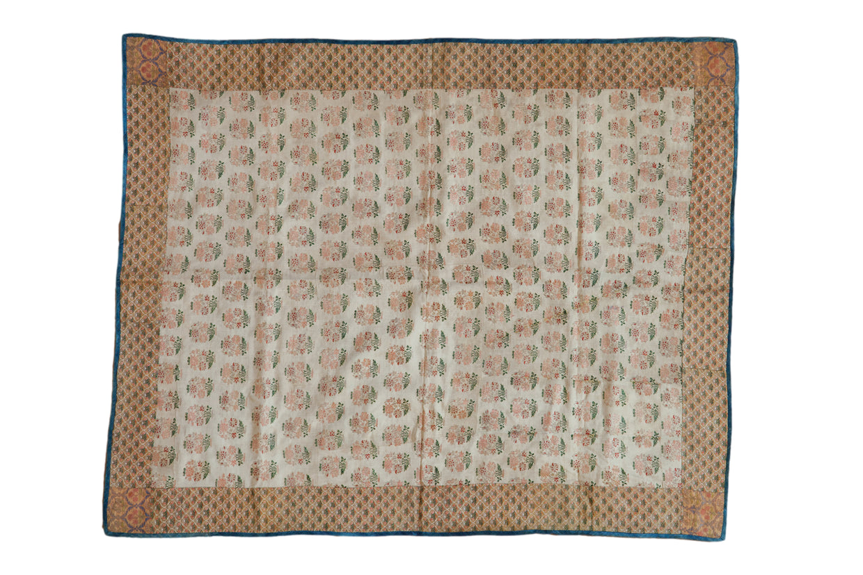 Antique 17th-century Safavid brocade textile with an allover floral pattern in soft pink and green on ivory.