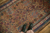Detailed weave of a collector Serab with sapphire medallions and a reciprocating pawn-design border.