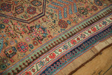 Pawn design border of an antique Serab rug, showing gem-tone colors and fine, low-pile wool.