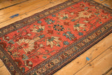 Detailed view of the antique Mehreban's geometric border and its characteristically low, even pile.