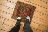 Small-scale vintage Farahan Sarouk rug mat, shown on the floor for size reference.