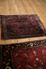 The soft, lustrous wool and floral bouquet design of an antique Lilihan square rug.