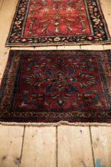 Fine antique Lilihan mat in burgundy and sapphire blue, styled with another Persian rug.