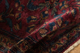 Soft, luxurious wool pile with a high sheen on an antique Persian Lilihan rug.