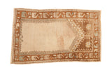 Vintage distressed Oushak rug with a unidirectional prayer design in coffee brown and seafoam green.