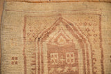 Even wear across the knot heads and low-pile texture of a distressed Anatolian rug.