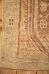 Evenly worn pile and intact side cord selvage on a hand-knotted vintage Anatolian rug.