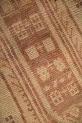 Hand-knotted texture of a distressed Anatolian rug with even wear to the knot heads.