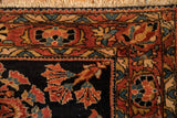 Detailed floral pinwheel border and fringe on a hand-knotted antique Persian Lilihan rug.