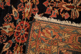 Hand-knotted foundation and dense floral pile shown on the corner of an antique Persian Lilihan rug.
