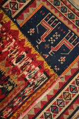 Reverse of an antique Soumac rug shows colorful weft floats behind the tight, flat-woven pictorial face.