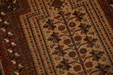 Detail of the low, even pile and geometric gul motifs on a hand-knotted antique Belouch rug.